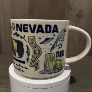 Nevada Ceramic Coffee Mug - White with Blue & Yellow Graphics